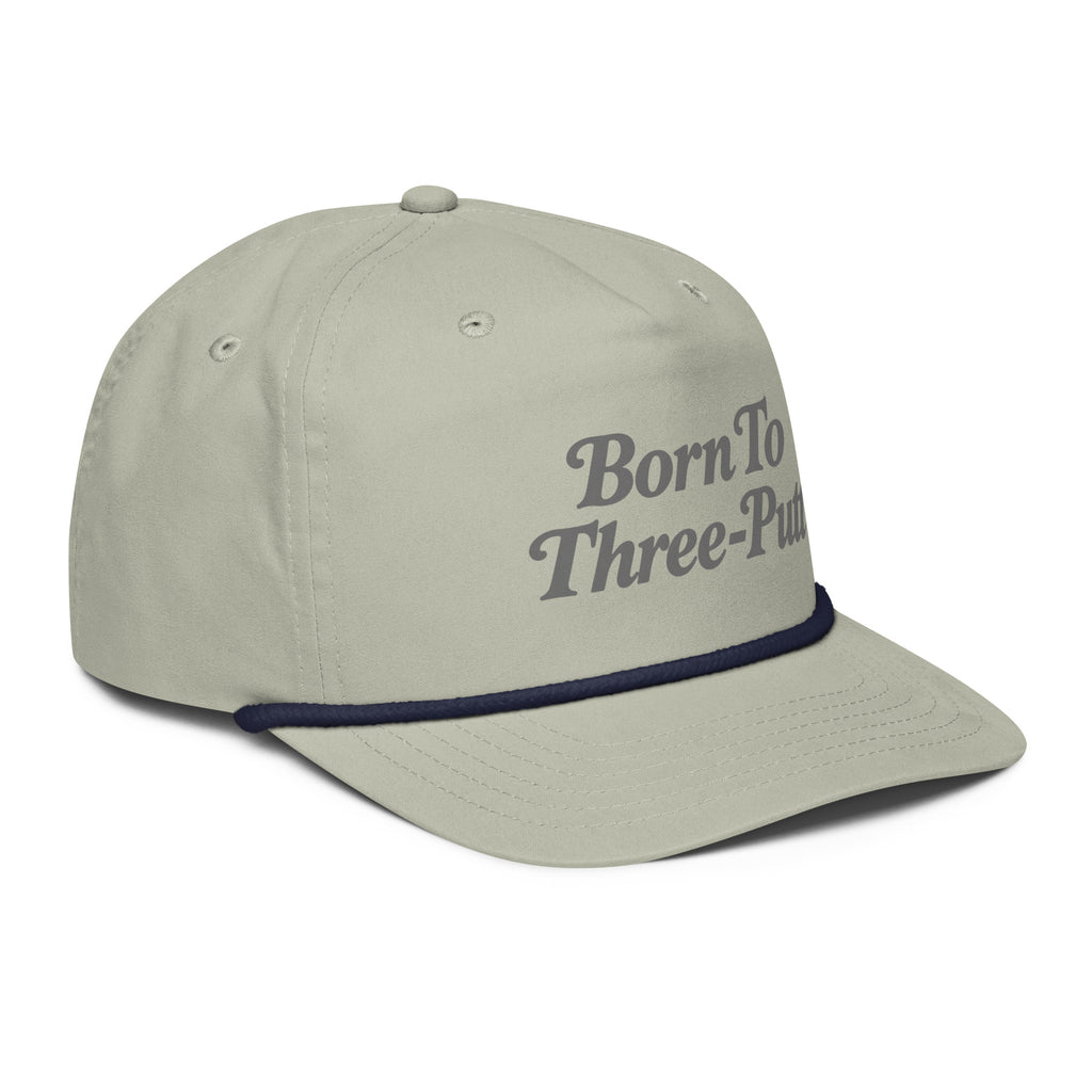 Angled front view of golf rope cap, light grey with navy rope, featuring Born to Three-Putt script lettering