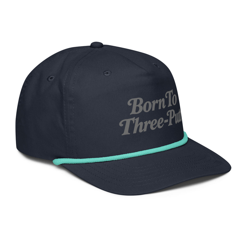 Angled front view of golf rope cap, navy with mint rope, featuring Born to Three-Putt script lettering