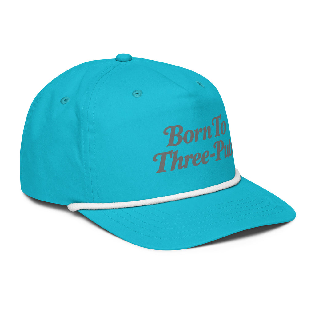 Angled front view of golf rope cap, turquoise with white rope, featuring Born to Three-Putt script lettering