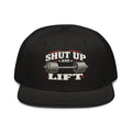 Front view of snapback hat, black, featuring Shut Up and Lift lettering and a barbell graphic