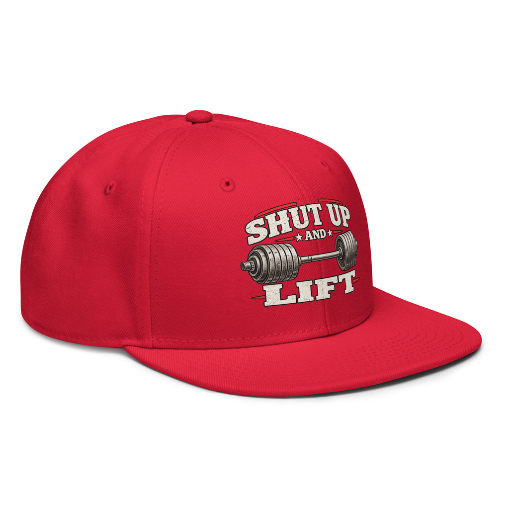 Angled front view of snapback hat, red, featuring Shut Up and Lift lettering and a barbell graphic