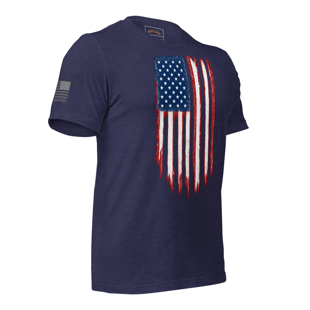 Angled front view of heather midnight navy T-shirt with a distressed red, white and blue American flag chest graphic and a smaller sleeve flag