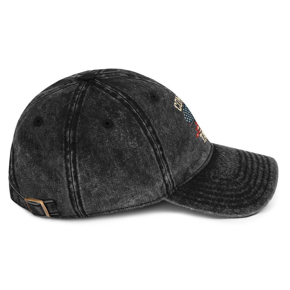 Right-side view of washed black vintage cap with Come and Take It lettering, American flag artwork and a rifle illustration