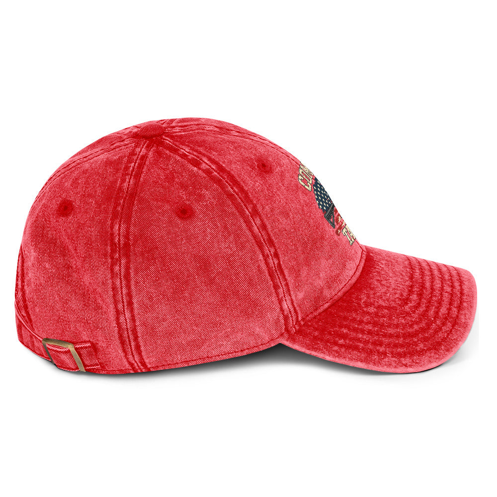 Right-side view of washed red vintage cap with Come and Take It lettering, American flag artwork and a rifle illustration